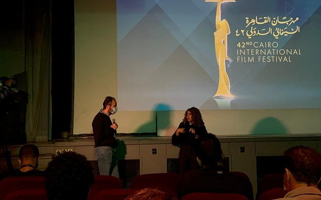 Q&A onstage with Sara Mesfer at the 42nd Cairo International Film Festival.